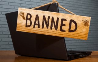 "Banned" Sign on Laptop