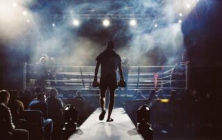 Photo of boxer walking into the ring